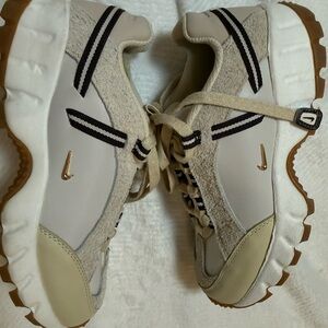 Jacquemus Beige and White Sneakers with Gold Accents